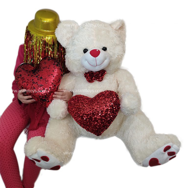 تصویر عروسک خرس پشمالو لاو قلب بدست